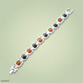 VASTUKOSHA silver-plated bracelet featuring alternating 5 Mukhi Rudraksha beads and black Karungali ebony wood beads.