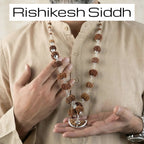 VASTUKOSHA 1-14 Mukhi Siddh Rudraksha Mala with authentic Nepali beads and 925 silver caps worn by a man