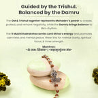 VASTUKOSHA Rudraksha bracelet featuring a silver Om, Trishul, and Damru charm resting on smooth stones.