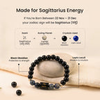 VASTUKOSHA Sagittarius zodiac bracelet featuring black obsidian and lapis lazuli beads with a central engraved charm.
