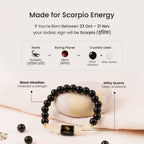 VASTUKOSHA Scorpio zodiac bracelet featuring black obsidian and milky quartz beads with a central Scorpio symbol charm.