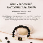 VASTUKOSHA Scorpio zodiac bracelet featuring black obsidian and milky quartz beads with a central Scorpio charm