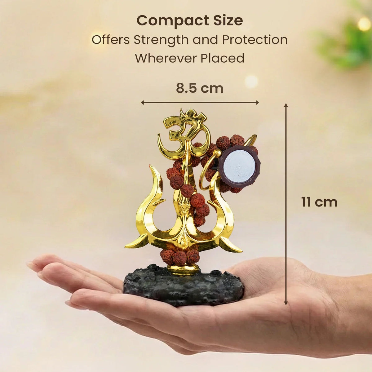 VASTUKOSHA Shiva Shakti Trishul murti with Om, Damru, and Rudraksha beads held in a palm for scale.