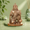 VASTUKOSHA Limited Edition Siddh Triveni Hanuman Murti in gold finish, featuring a sitting pose with a mace.