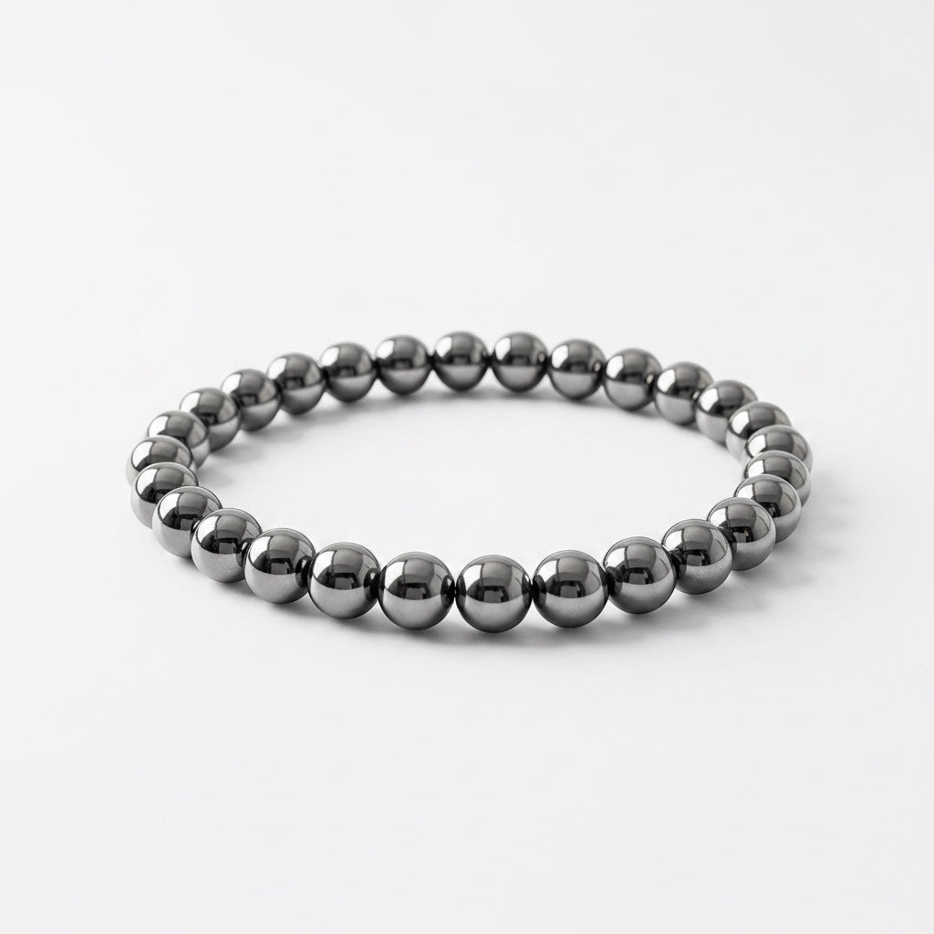 VASTUKOSHA Karz Mukti bracelet made of polished silver hematite beads on a white background