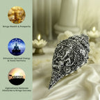VASTUKOSHA silver-plated Ganesh Shankh conch shell with intricate carvings for puja, meditation, and spiritual decor.