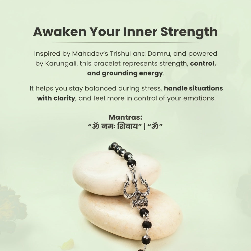 VASTUKOSHA Mahadev Trishul and Damru bracelet with black Karungali beads and oxidised silver finish on smooth stones.