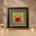 VASTUKOSHA Vyapar Vriddhi Yantra featuring a gold-toned square plate framed by textured raw pyrite for business growth.