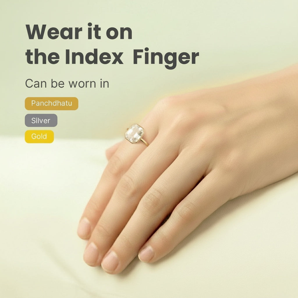 VASTUKOSHA White Pukhraj gemstone ring worn on an index finger, suitable for silver, gold, or panchdhatu settings.